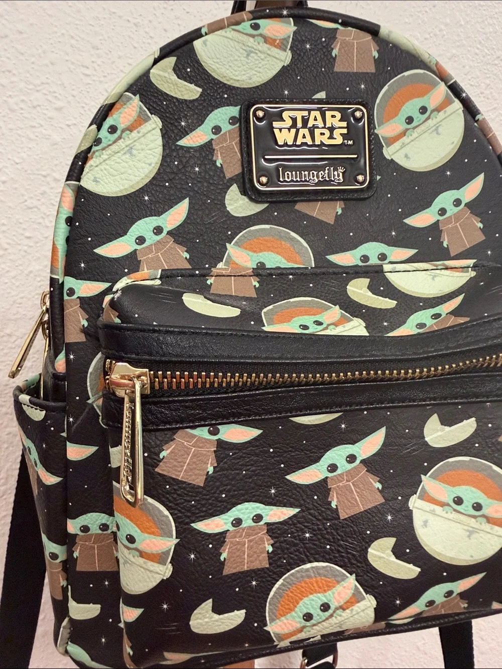 Loungefly Black Baby Yoda Pattern Mini Backpack with Green and Brown Accents